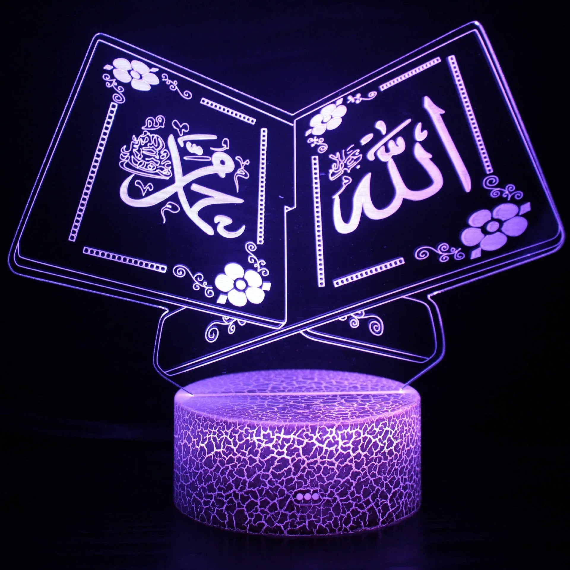3D small night lamp with LED colourful lighting and black base on bedside table