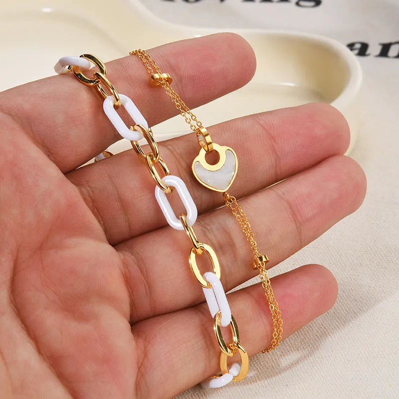 Women's stainless steel resin bracelet with double-layer loving heart design