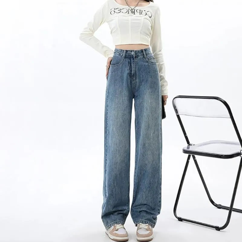 Women's retro blue wide leg jeans with high waist design and straight cut on model