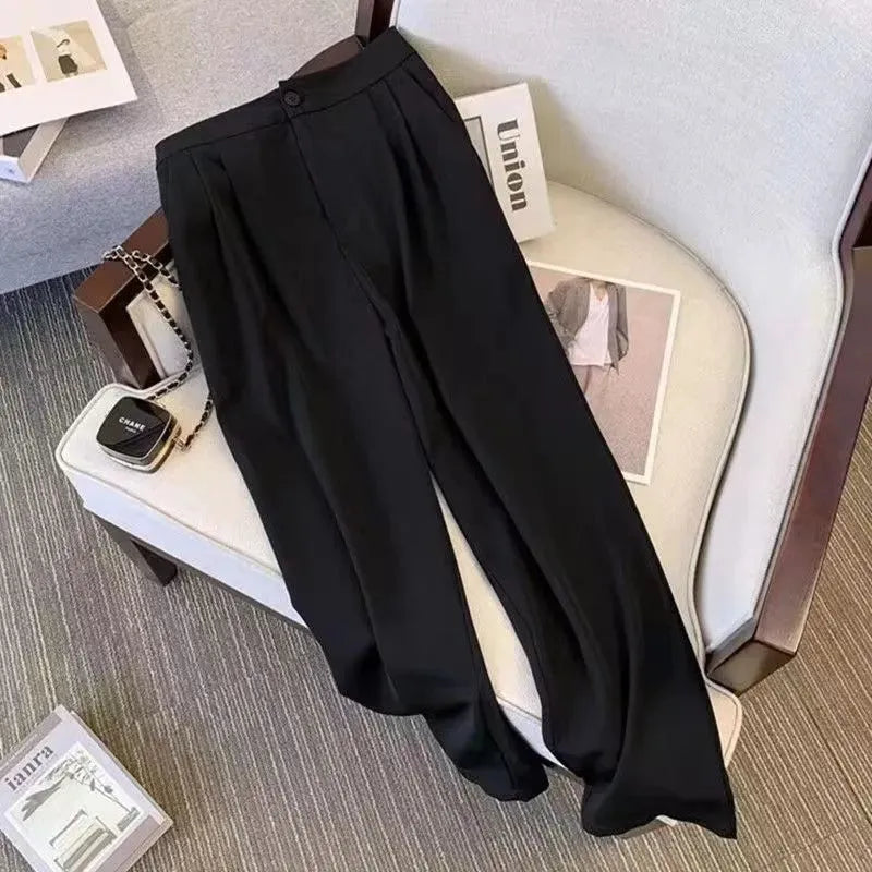 Women's loose fit polyester blouse in multiple colours with regular sleeves and 50cm length