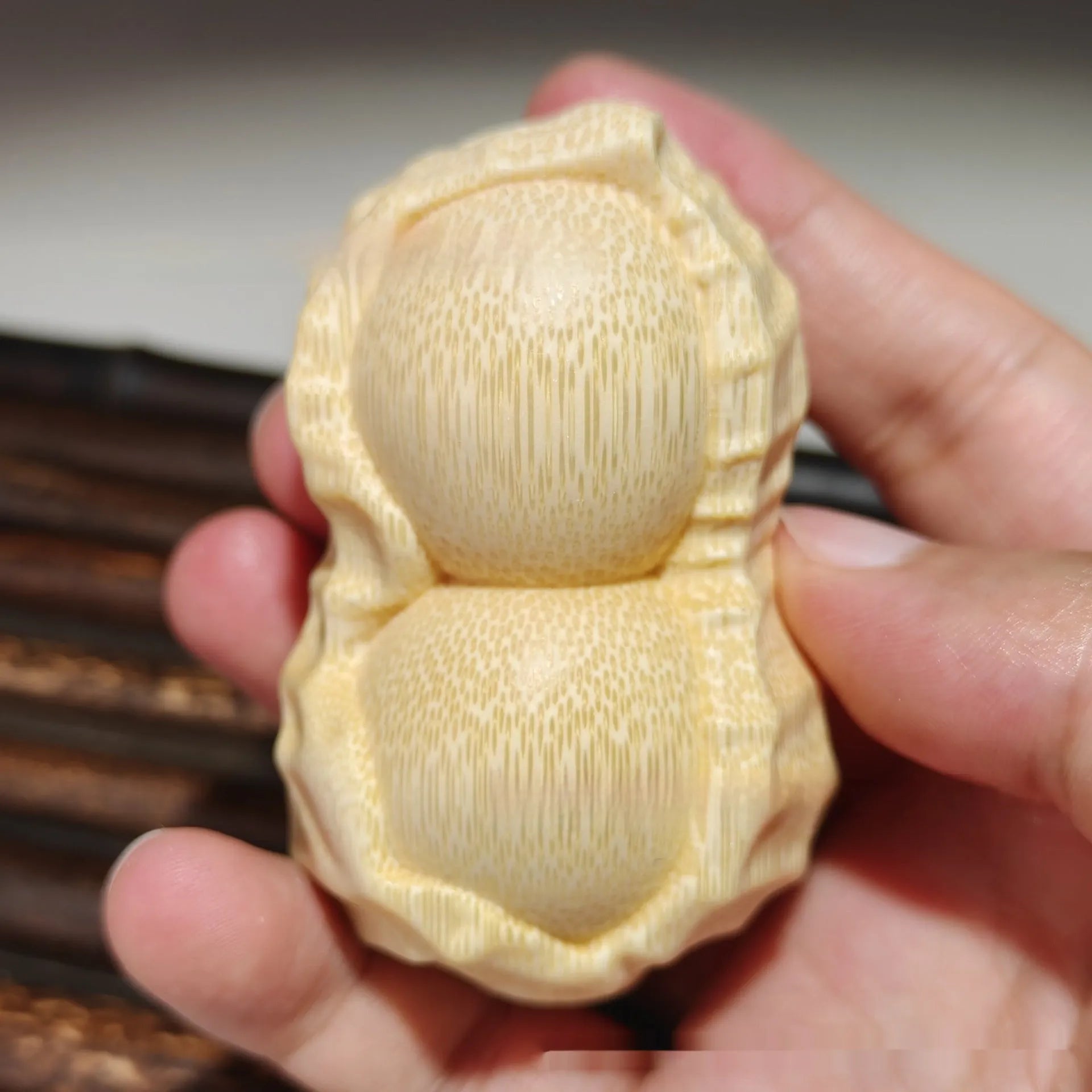 Natural bamboo carving peanut ornament with modern minimalist design and meaningful size detail