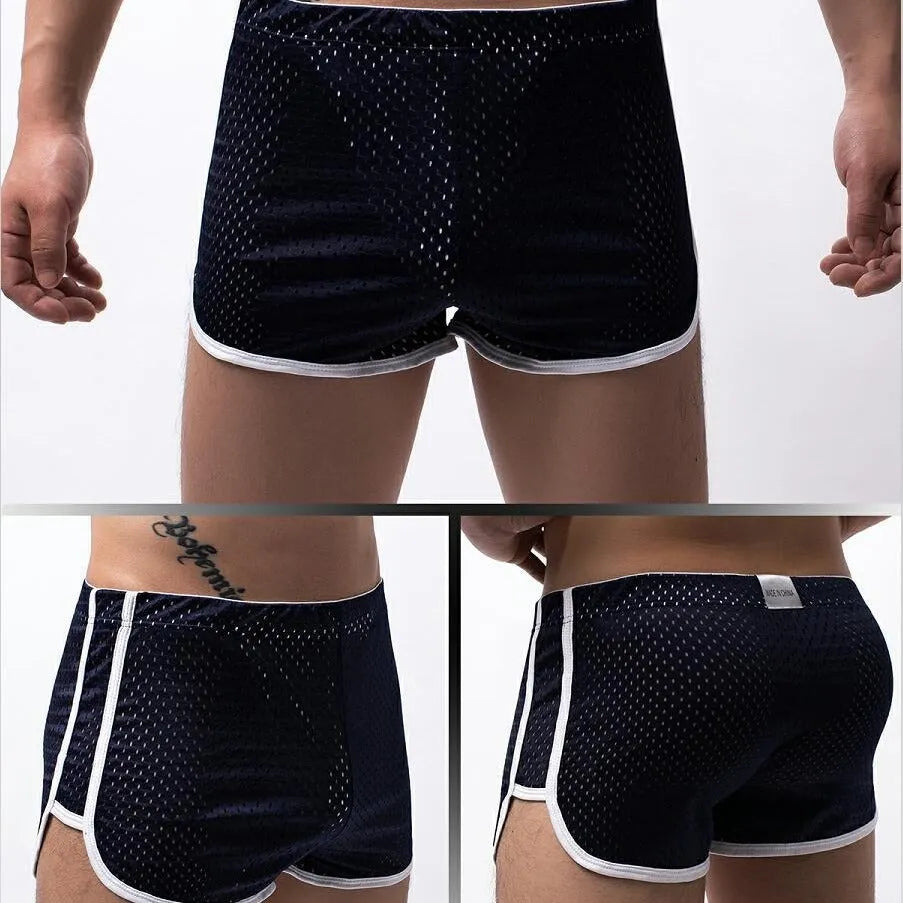 Men's cotton three-point boxer shorts in light blue on a grey background