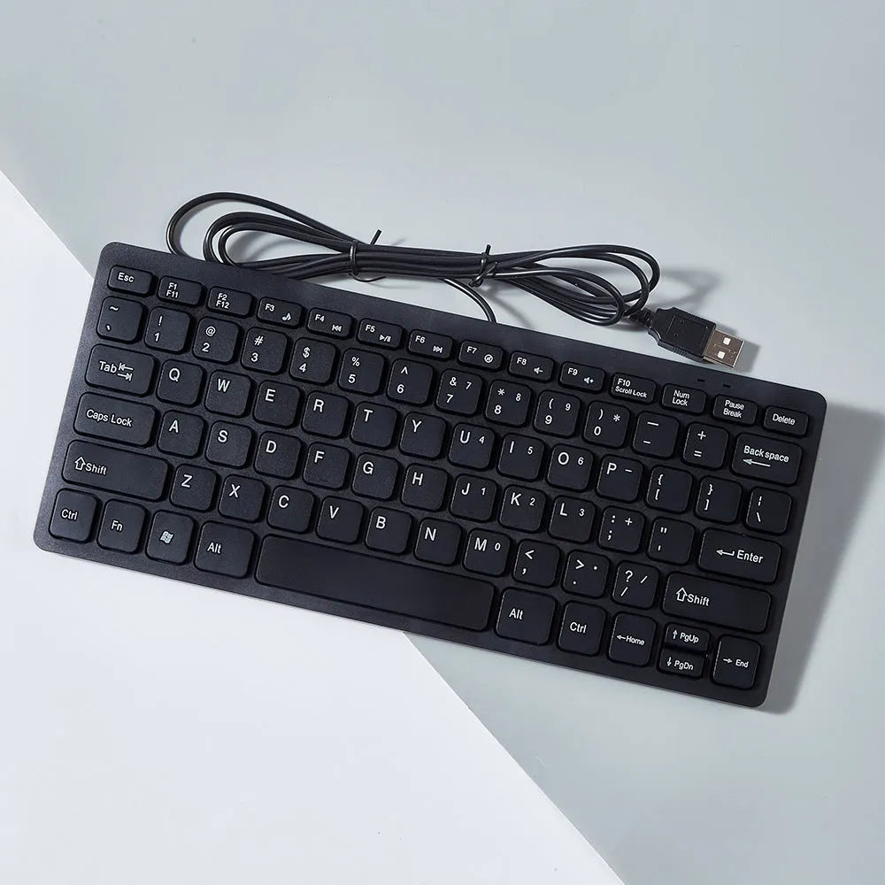 Compact wired USB keyboard in blue colour showing 280mm width and noiseless keys