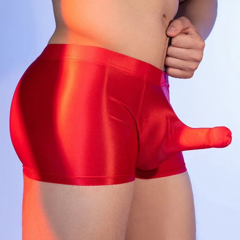Red men's nylon boxers with an elephant nose design on a mid waist.