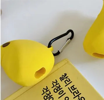 Yellow banana-shaped silicone protective case for Apple AirPods Pro and AirPods 3rd generation.