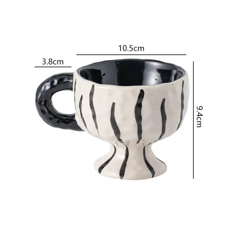 Hand-pinched irregular ceramic mug with solid colour design, approximately 14.5cm tall