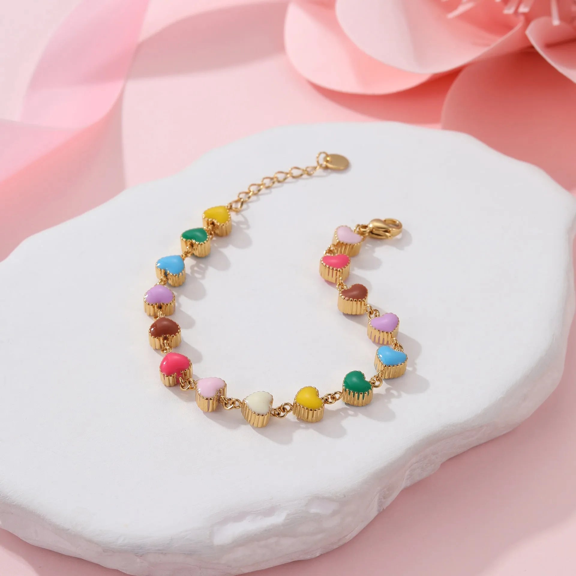 Women's adjustable heart pendant bracelet with colourful oil accents in gold or steel finish