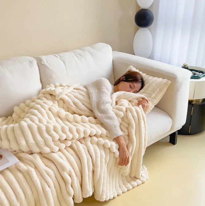 Solid colour bubble faux rabbit fur double-sided thickening blanket shown in a khaki colour
