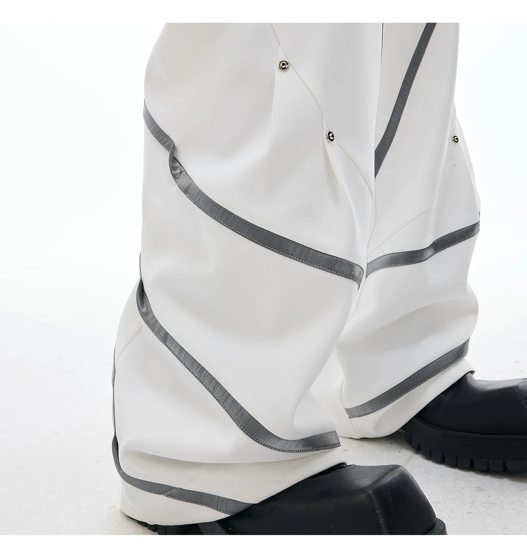 Men's pleated trousers with metal rivet stripes and three-dimensional cutting