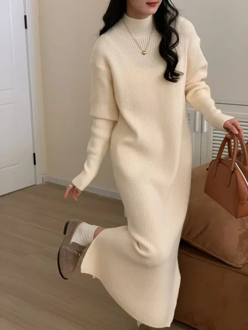 Beige acrylic knit dress with half-turtleneck collar and high waist.
