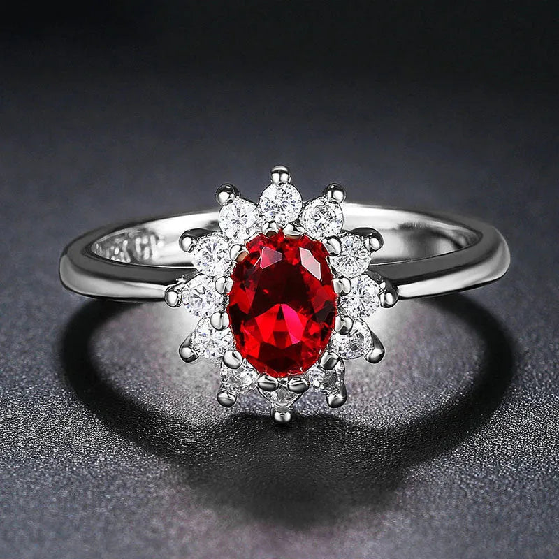 Women's blue moissanite ring with floral electroplated copper band and inlaid zirconium setting.
