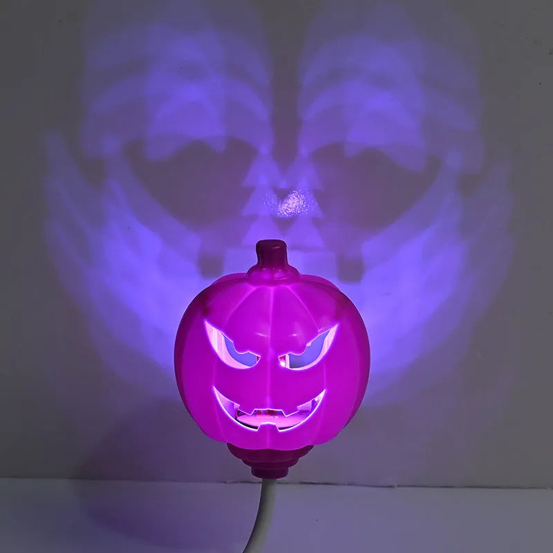 Purple and yellow light USB rechargeable plastic pumpkin lamp for Halloween decoration.