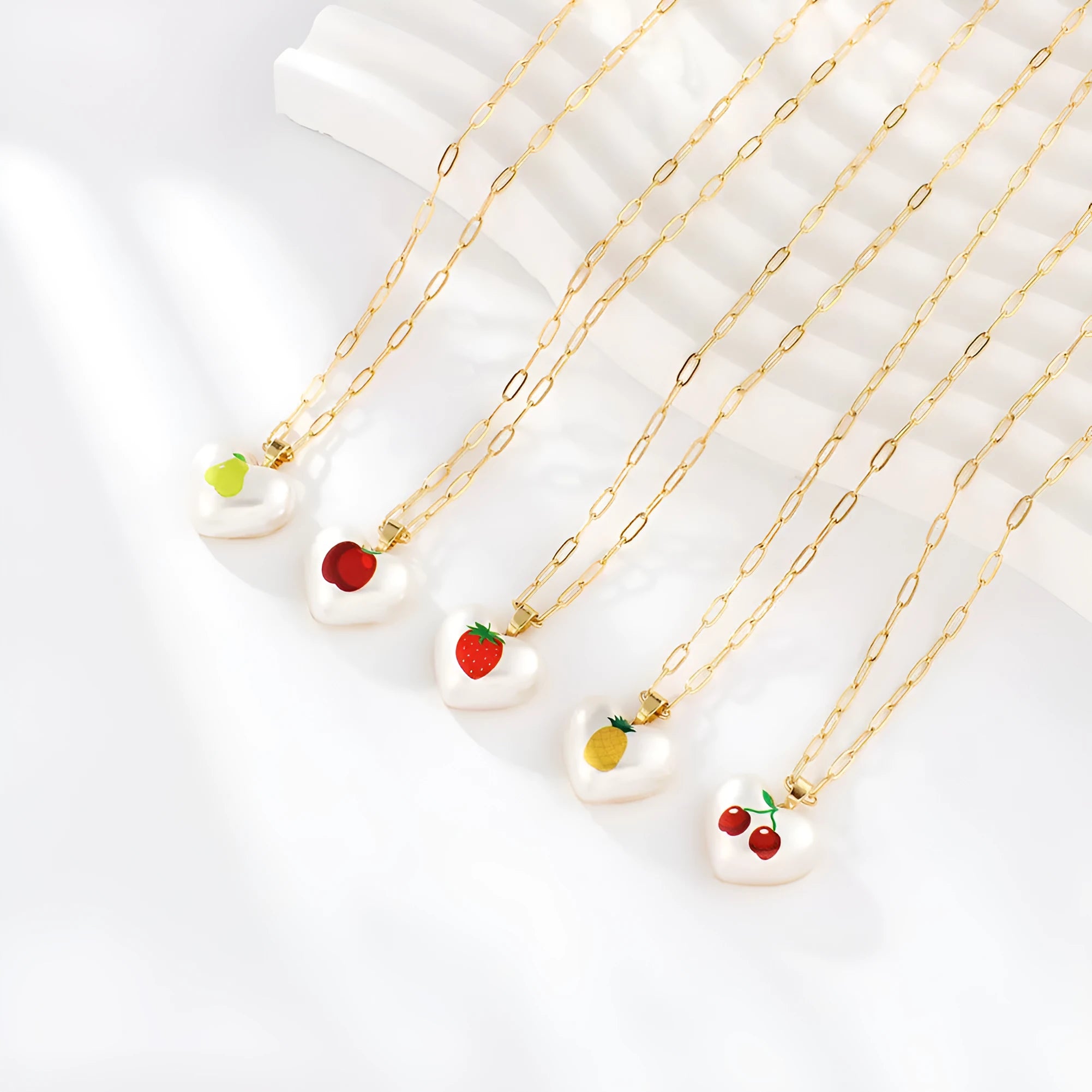 Silver tone heart necklace with geometric fruit pendant on adjustable 21-50cm chain