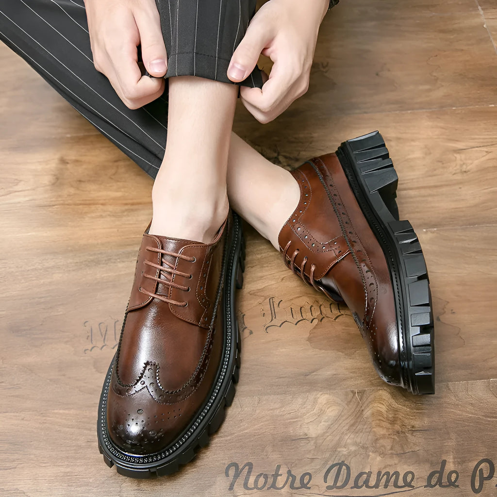 Men's black and brown business brogue shoes with round toe and brogue detailing.