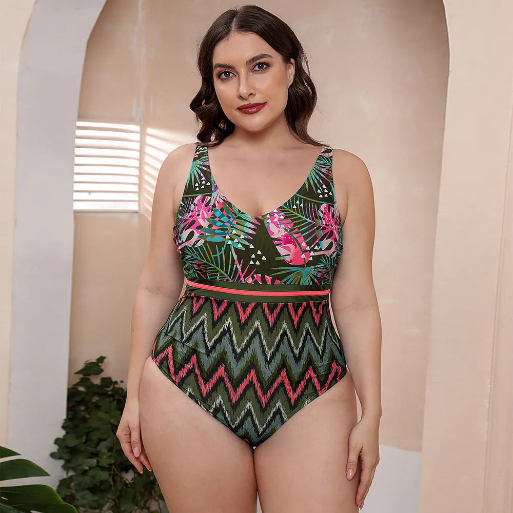 Blue striped one-piece swimsuit with spaghetti straps for women on a mannequin.