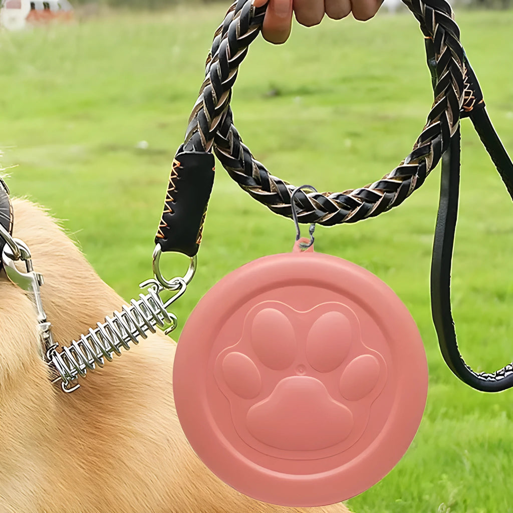 Portable collapsible dog bowl with attached snack box in light pink and light green colour options