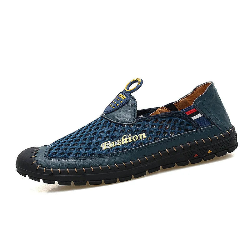 Men's brown breathable mesh casual shoes with round toe and rubber sole on a plain background.