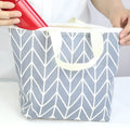 Arrow print polyester makeup bag with zippered closure for moisture-proof storage.