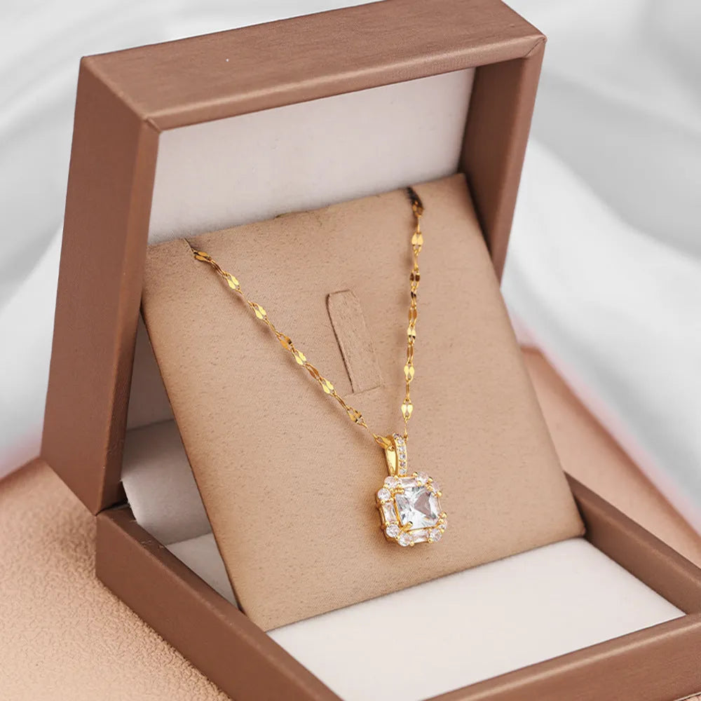 Women's titanium steel geometric necklace with quadrilateral gem-inlaid pendant on water wave chain