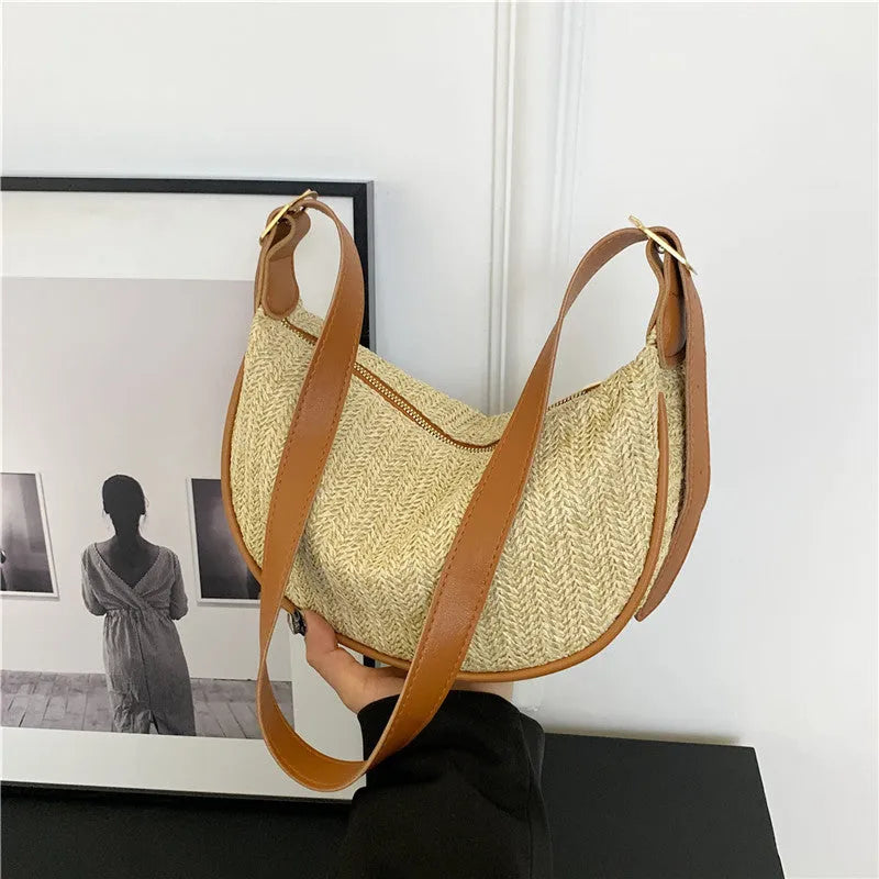 Women's straw woven crossbody bag with internal phone and document pockets in corrugated finish
