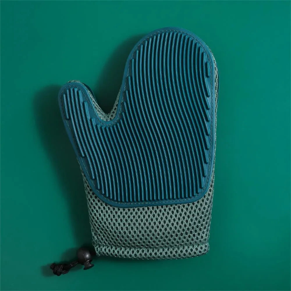 Pet grooming glove for hair removal in dark blue colour showing mesh fabric texture