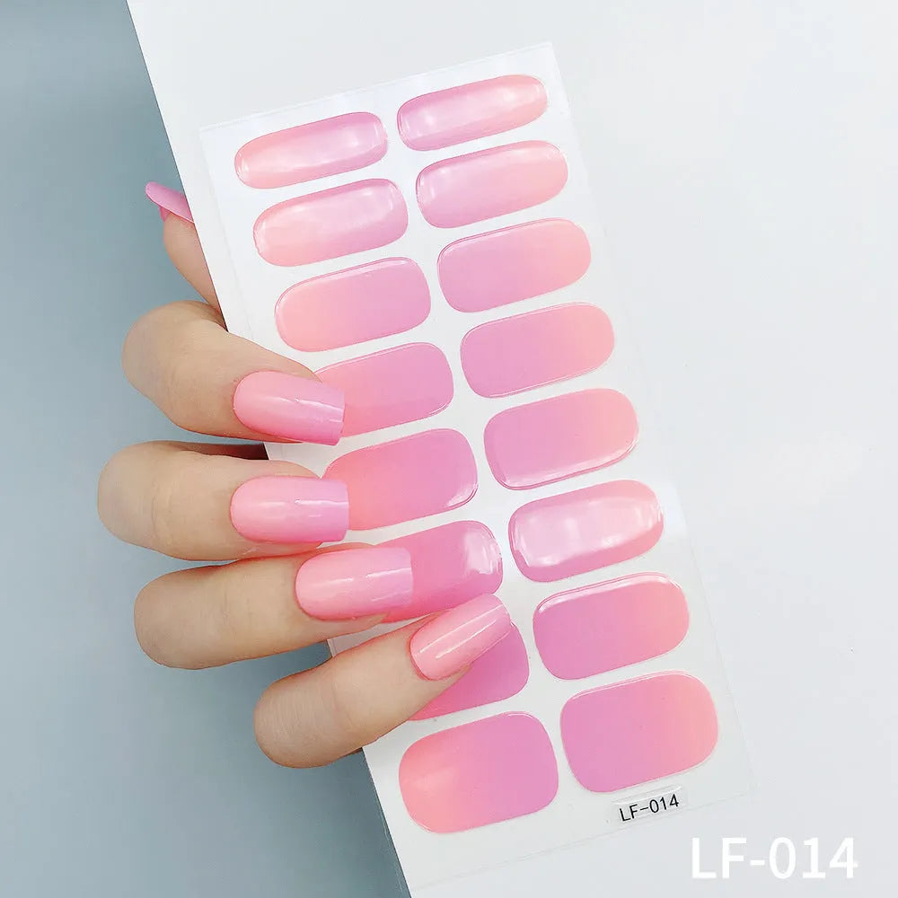 Full nail art sticker sheet showing 16 different solid colour designs including European simple nails and floral patterns