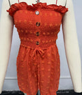 Blue women's off-shoulder sleeveless jumpsuit with button detail on mannequin
