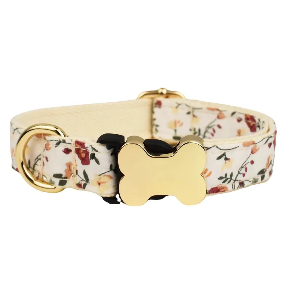 Flat nylon dog collar with a printed grid pattern and a central bone-shaped metal buckle.