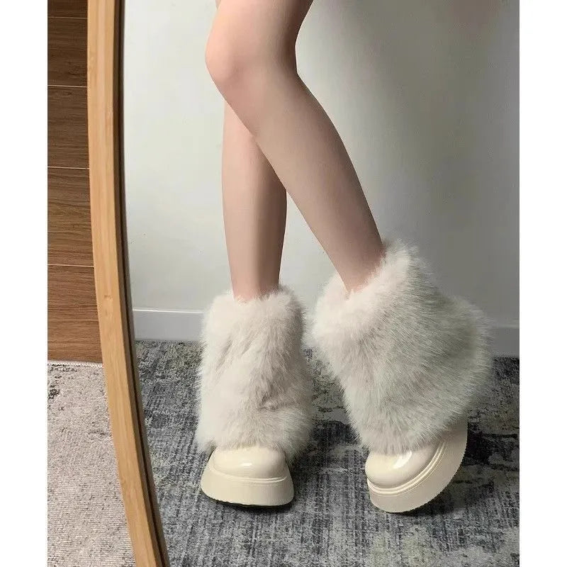 Women's black artificial plush snow boots with fleece lining and waterproof platform sole