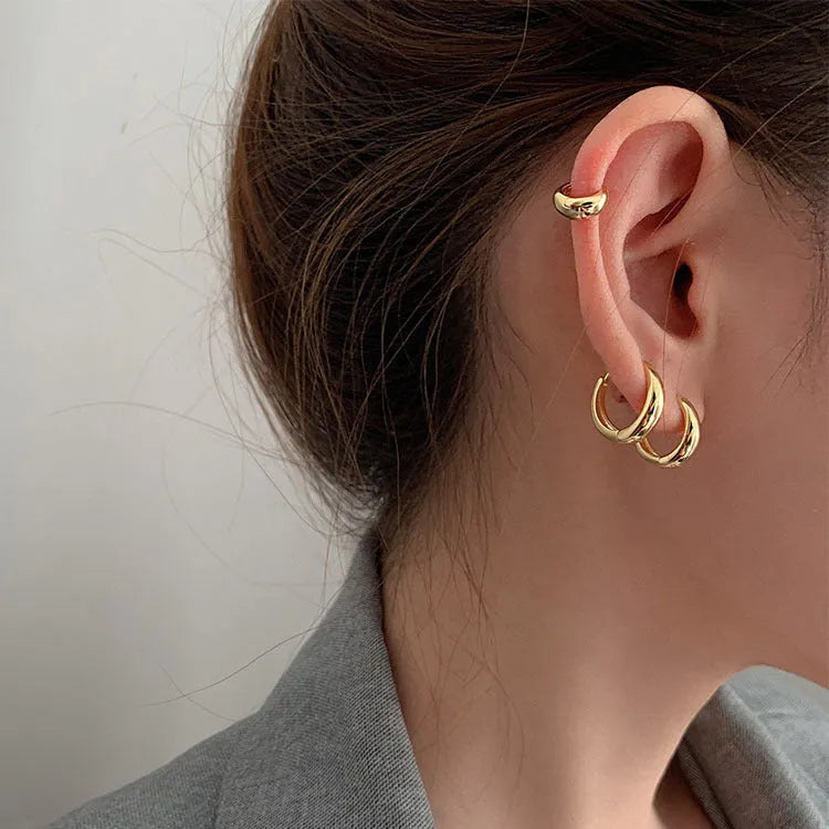 Women's geometric water drop earrings in gold or silver with retro minimalist circular design