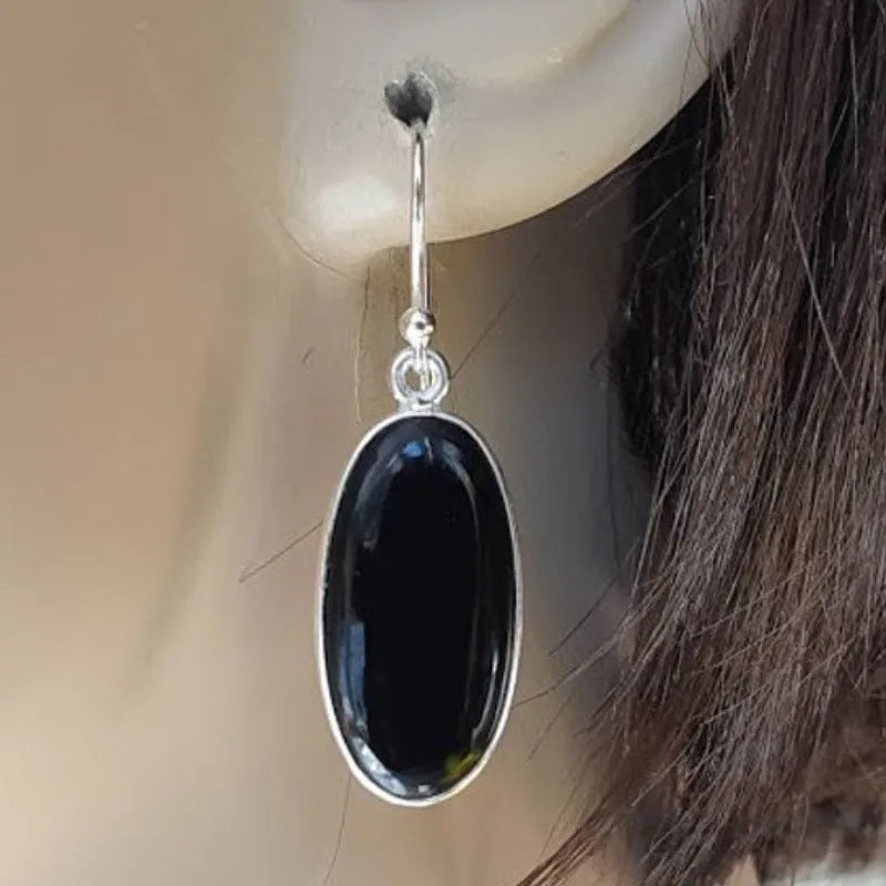 Chinese style women's earrings with oval black agate pendant and 925 silver electroplated alloy construction