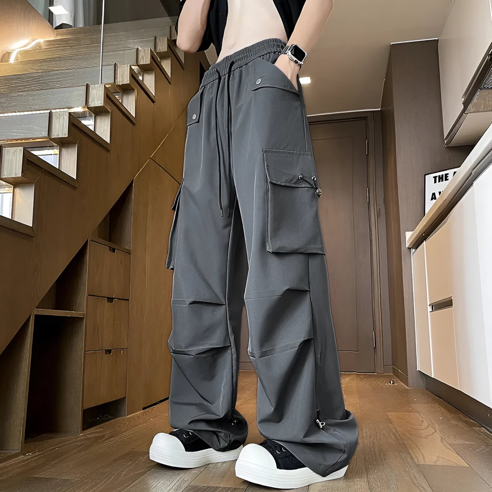 Plus size women's waterproof straight-leg trousers in thin polyester fabric with drawstring waist