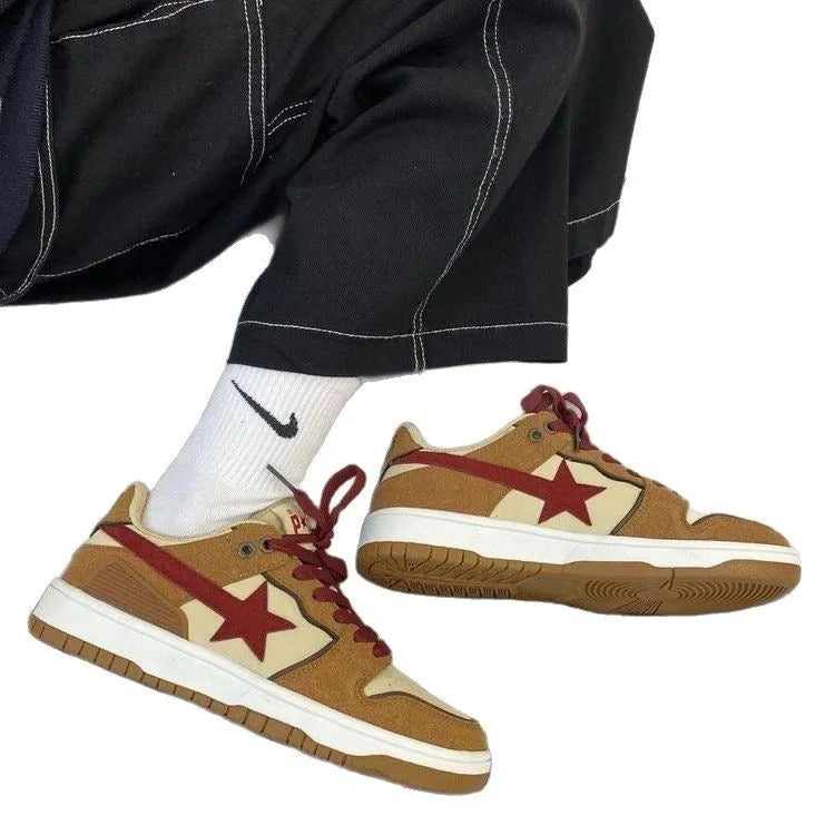 Brown women's lace-up platform sneakers with sequin details and a rubber sole.