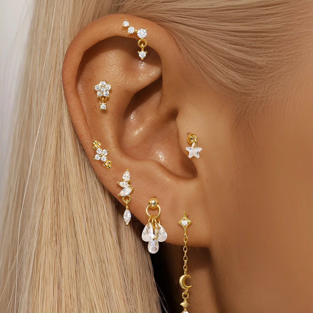 S925 sterling silver moon and star earrings with embedded diamond detailing in gold colour