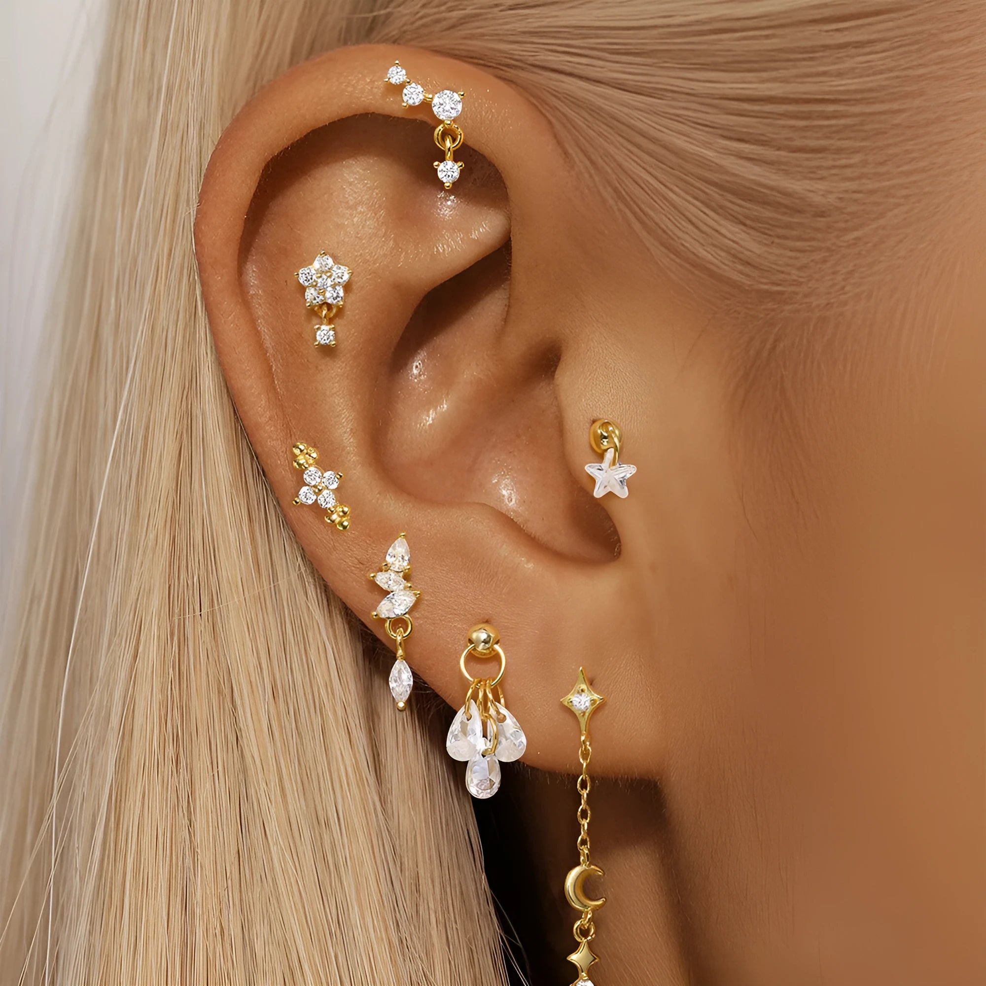 S925 sterling silver moon and star earrings with embedded diamond detailing in gold colour