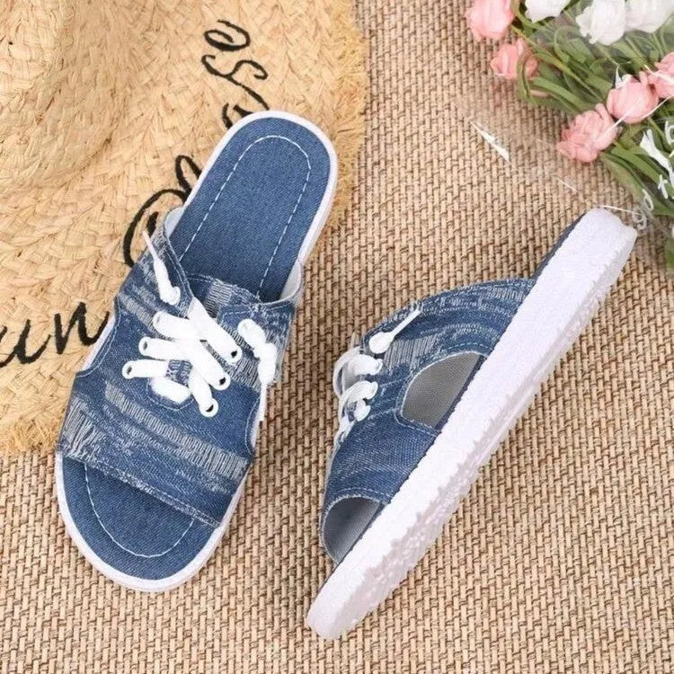 Blue women's Roman style canvas slippers with cloth lining and rubber soles