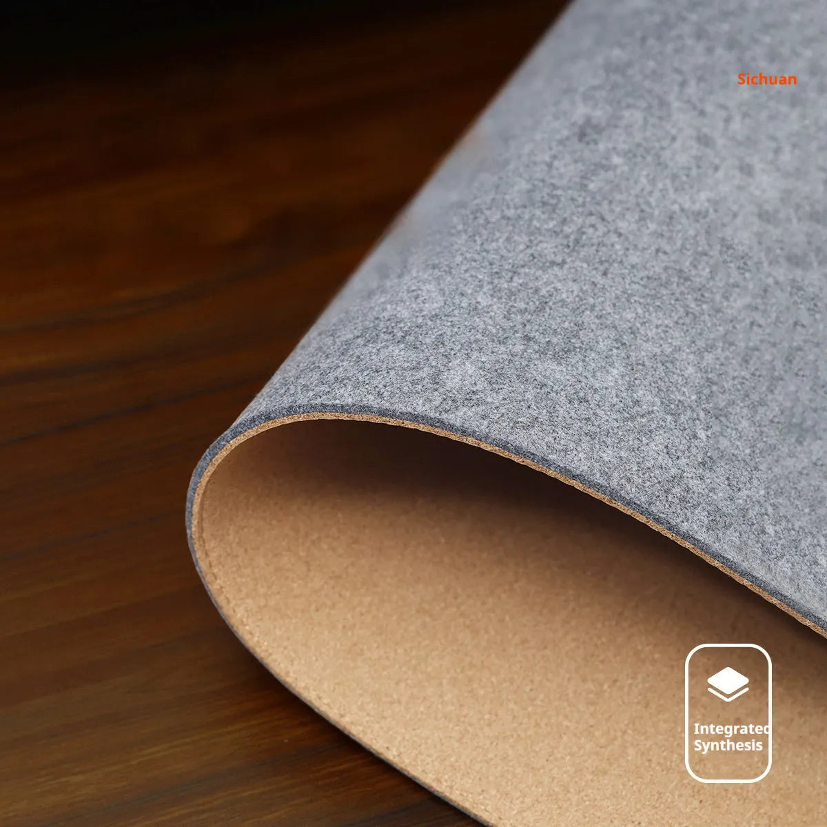 Oversized felt and cork office mouse mat showing black grey colour option on desk
