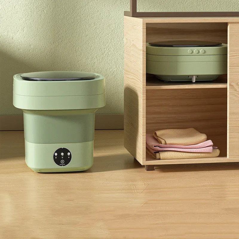 Mini foldable washing machine in green with blue light sterilisation and drain basket