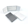 Tri-fold Bluetooth keyboard shown in black and silver colours with compact folded design