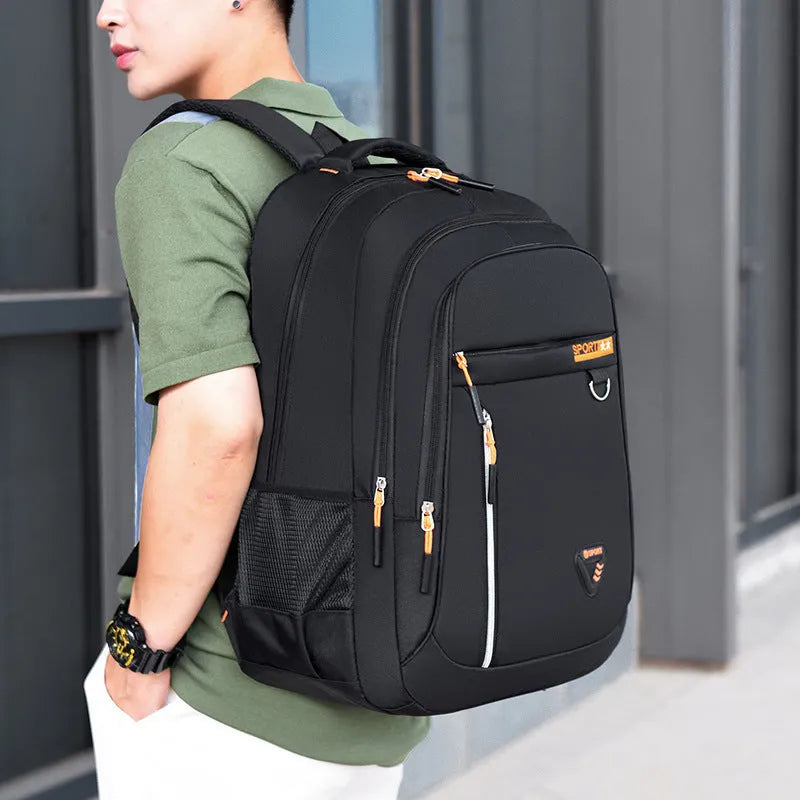 Men's Oxford cloth large capacity schoolbag with air pillow belt system in black, blue, green, or red colours