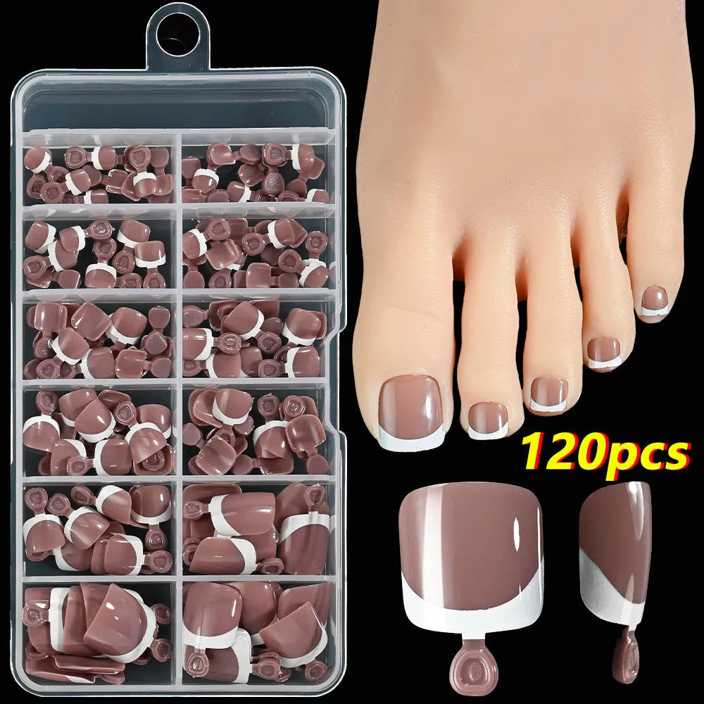 Box of 120 French white edge full square short nude toe nail tips on a white background.