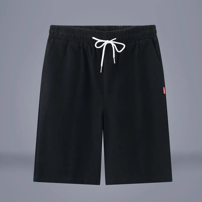 Solid colour cotton linen cropped summer pants with a drawstring waist on a hanger.