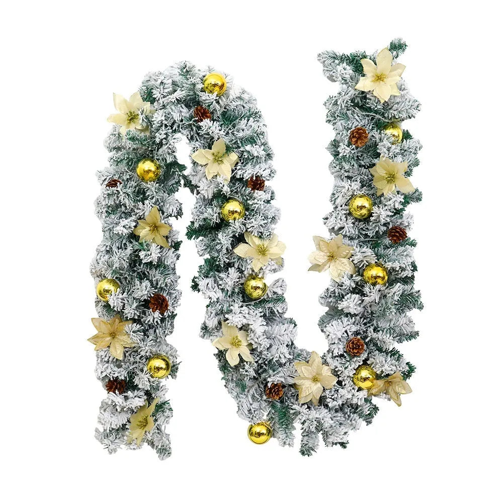 Christmas rattan garland decoration with flocked texture in five colour options displayed draped