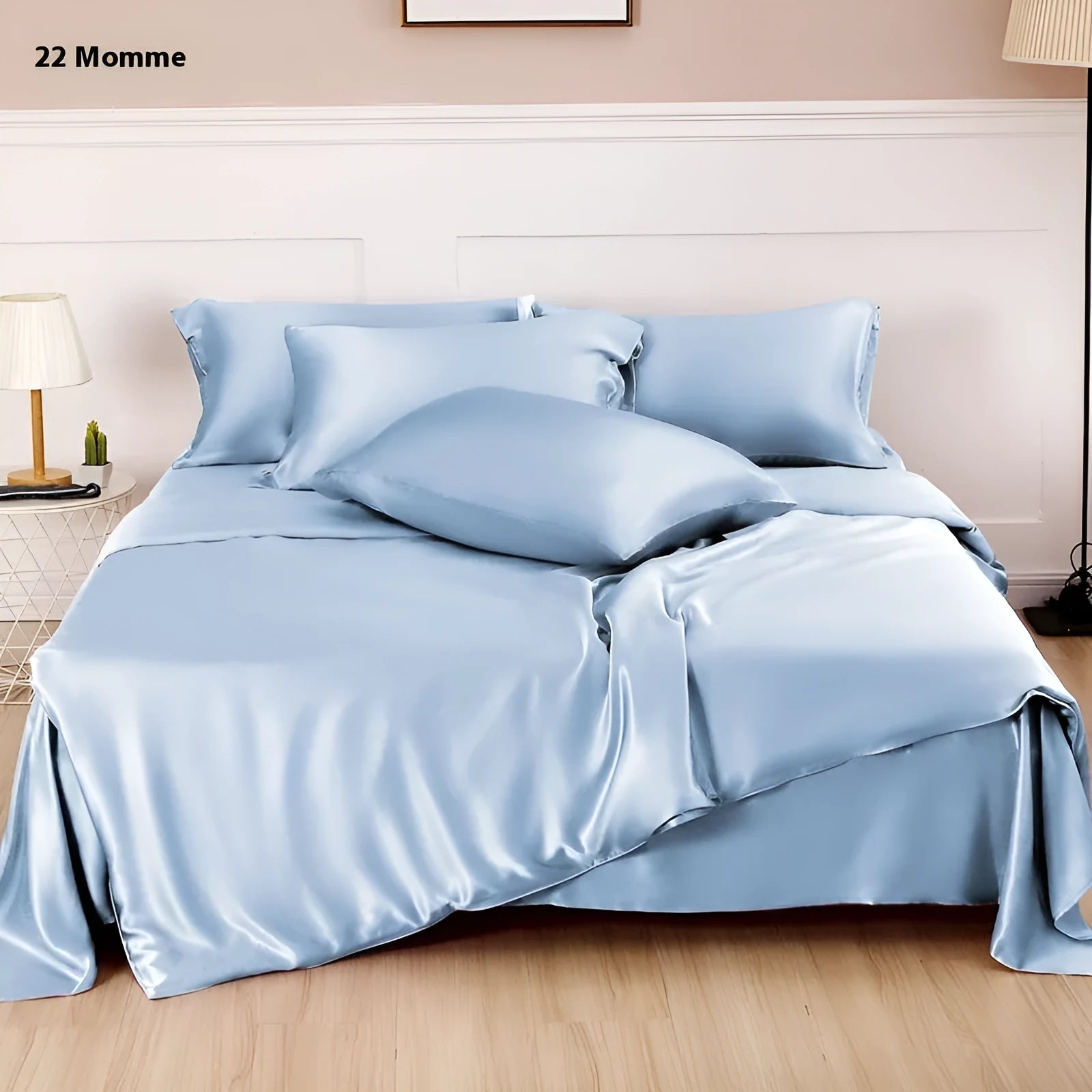Reversible silk duvet cover folded to show Lotus Pink and pea green sides, with bright brown and silver blue colour swatches.