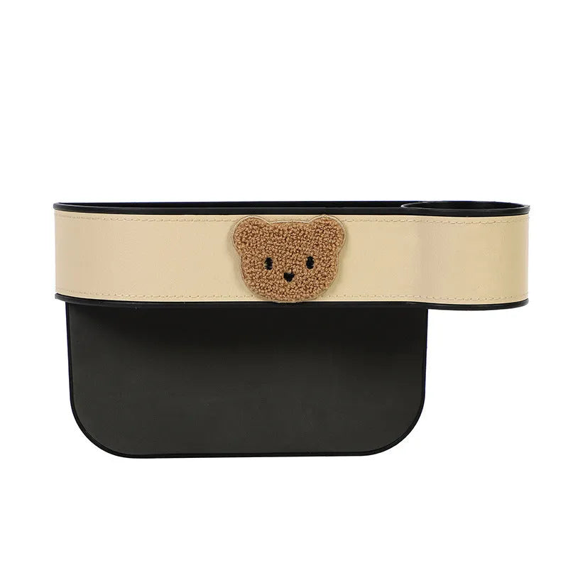 Leather car seat gap storage box with cartoon bear design hanging between vehicle front seats