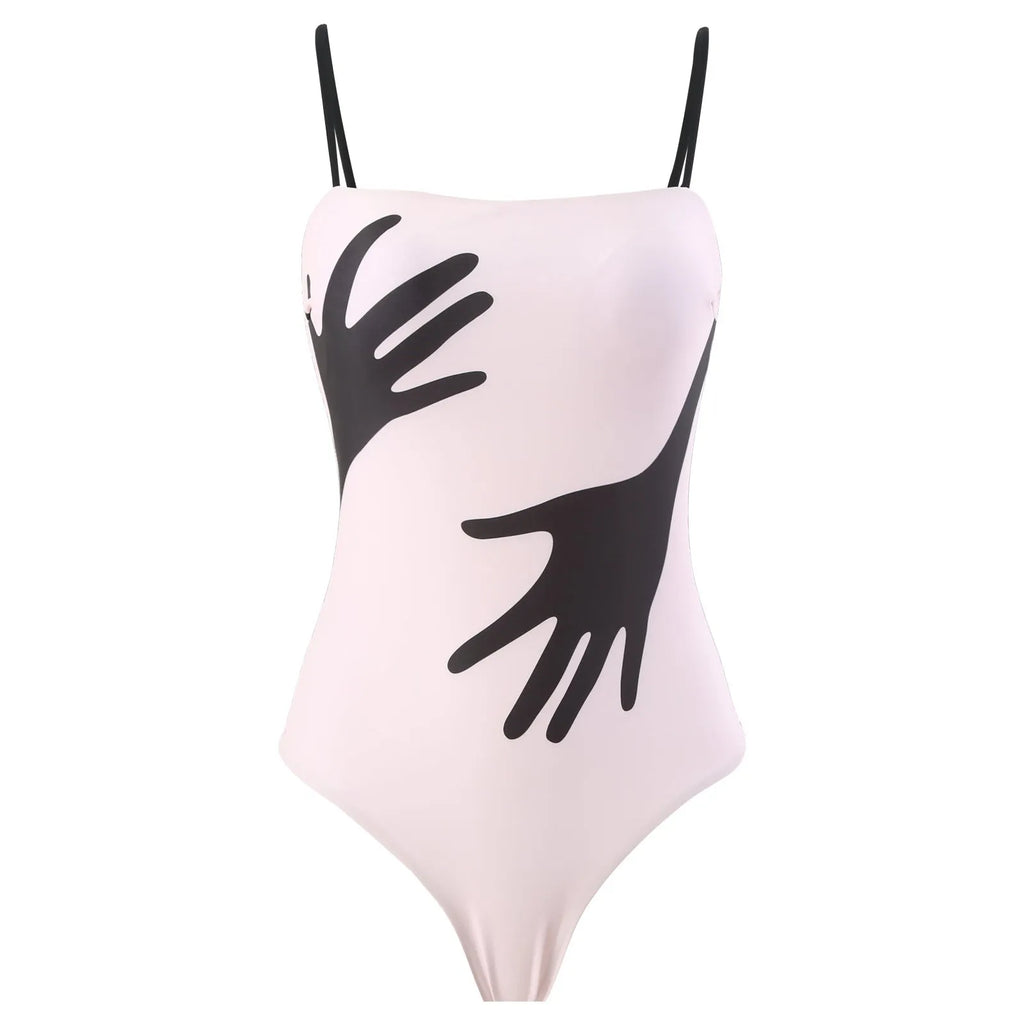 Women's patterned bikini swimsuit with a lightweight white tulle skirt attached.
