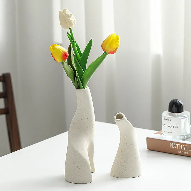 Ceramic shaped double vase in cream colour for Nordic home decoration on shelf