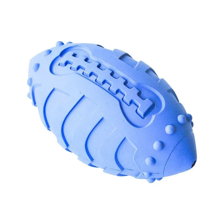 Sapphire blue rugby-shaped rubber dog toy with textured surface for teeth cleaning