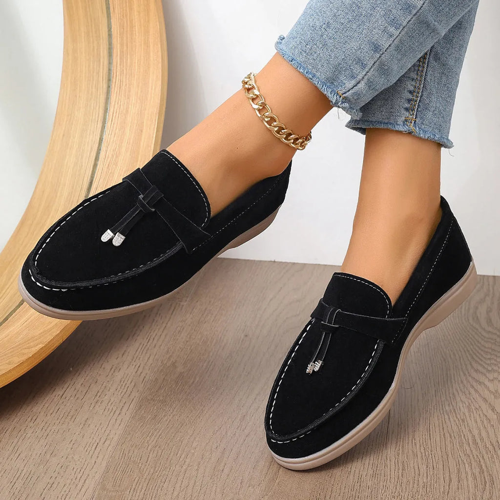 Casual canvas slip-on loafer shoes with a platform heel, shown in solid colour options.