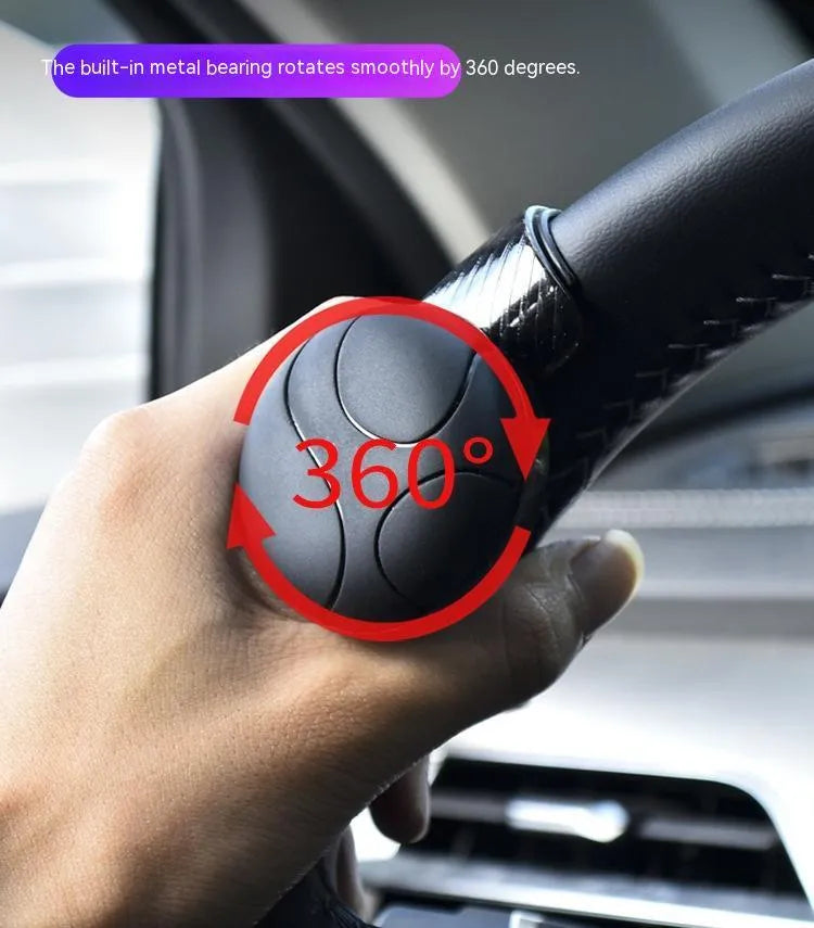 Black silicone steering wheel assist ball with metal bearing mechanism for single hand driving